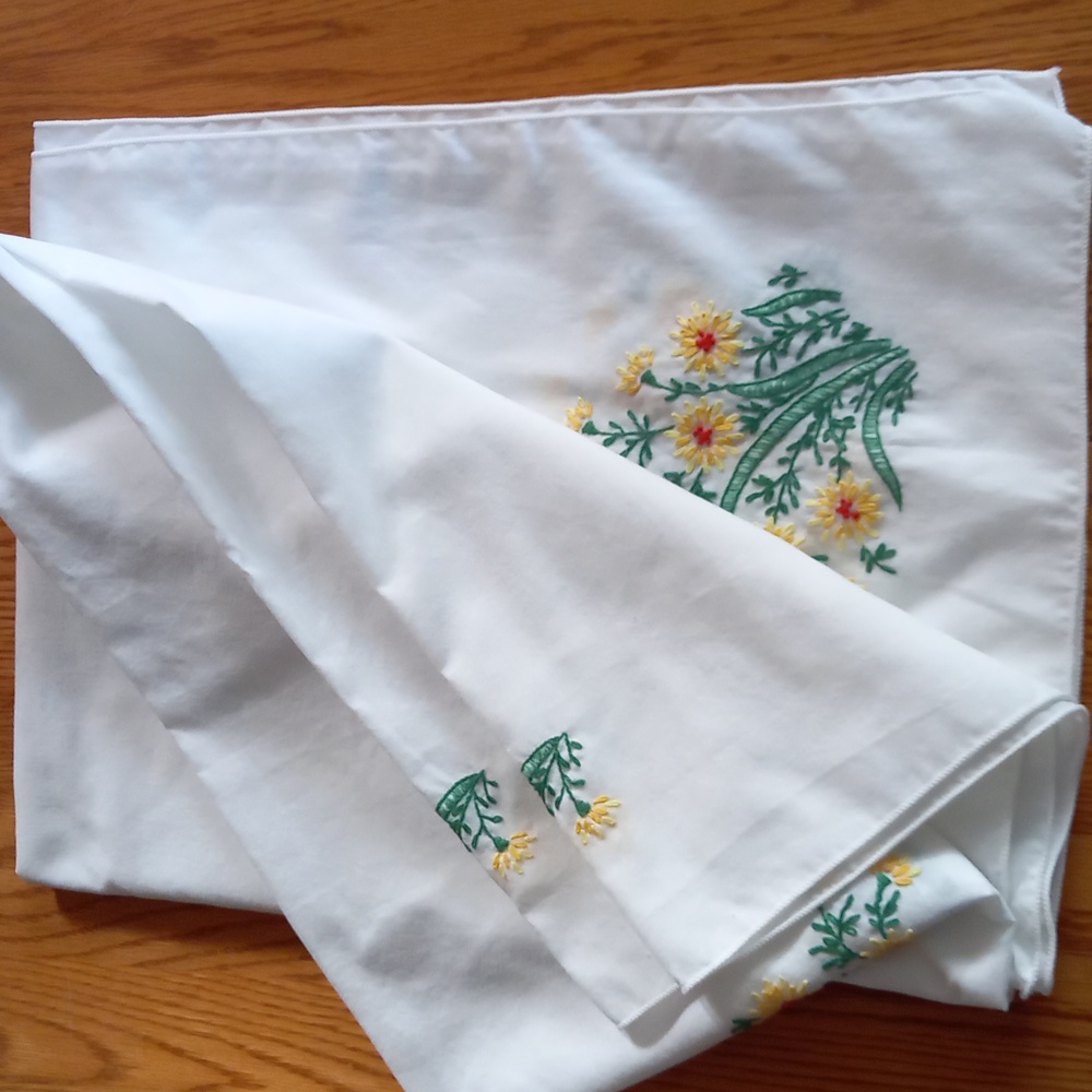 Crisp white cotton embroidered tablecloth